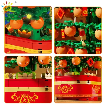 HUIQIBAO 666pcs Nápad pomarančovníka Rotujúce Music Box Stavebné Bloky Cteator Svetlo Tehly Nastaviť Deti Hračky Nový Rok Dekorácie