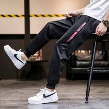 Náradie nohavice pánske módne značky nohy záväzné voľné športové Harun nohavice na jar deväť bod nohavice bežné nohavice kórejský Trend