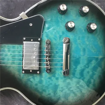 Veľkoobchod továreň na mieru blue elektrická gitara a Qui stitched javorový top gitara (s striebro hardvér) môžete prispôsobiť akejkoľvek st